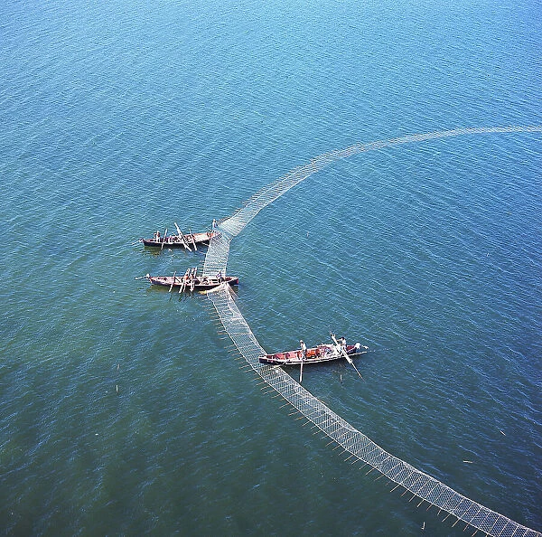 Fishermen on Lake Varano