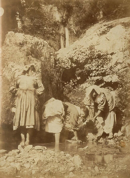 Full-length portrait of three peasants in ciociarian dress. Two women are washing clothes in a brook. The third is standing, leaning against a rock. In the background a waterfall