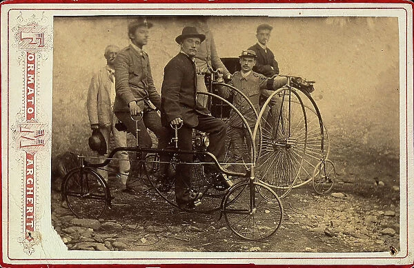 Group of men with various bicycle models