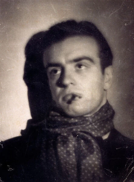 Half-length portrait of a young man with a cigarette in his mouth and a scarf around his neck
