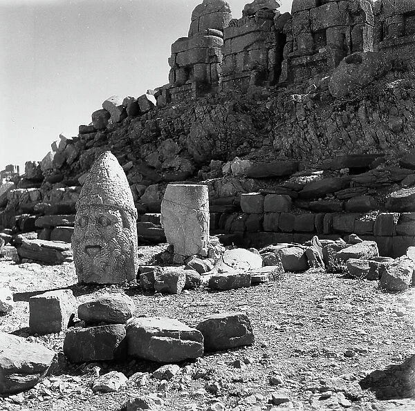 Heads of colossal statues and other finds from the Tomb of Antiochus I, on the summit of Nemrut Dagi
