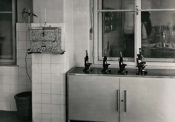 Laboratory of Merceology at the Technical Institute of Bolzano; on the counter some microscopes and a measuring instrument for flour moisture measurement