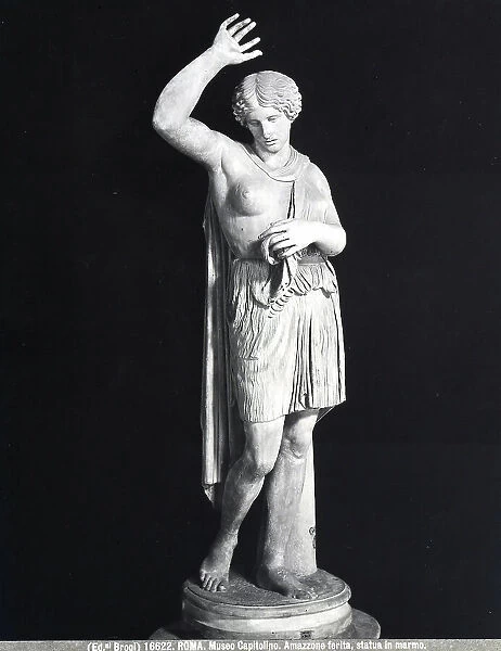 Marble statue of a wounded Amazon, on display in the main hall of the Capitoline Museum in Rome