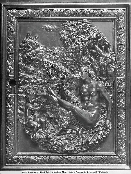 Panel of a piece of wooden furniture with Leda and the swan in bas-relief. The work, formerly in the Muse du Moyen-Age de Cluny, is now preserved in the Muse de la Renaissance, Ecouen