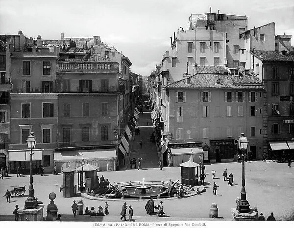 Piazza di Spagna in Rome: the Barcaccia Fountain and via Condotti in the foreground