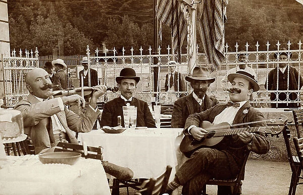 Portrait of musicians seated at a bar, postcard