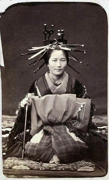 Portrait of a young Japanese woman in traditional costume