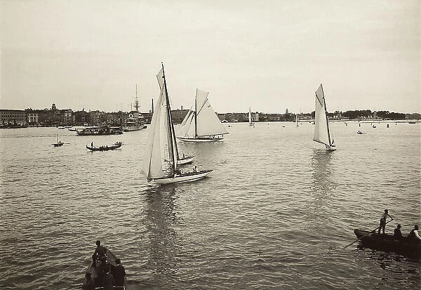 Sailboats off the shore of the Lido of Venice