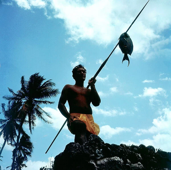 Tuamotu Islands. Rangiroa. The 'pati', spear fishing Polynesian