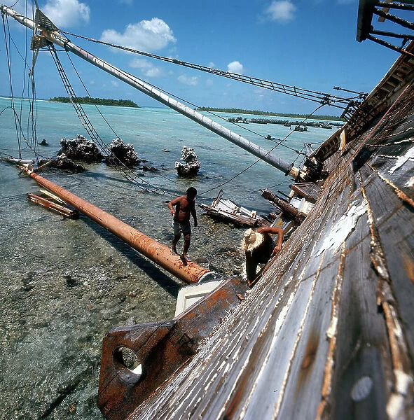 Tuamotu Islands. Rangiroa. Wreck of the brigantine sailboat 'Wanderer', on the coral reef
