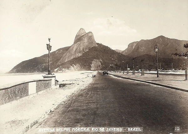 View of the Avenida Delfin Moreira in Rio de Janeiro, Brazil. A car is visible in the middle of it