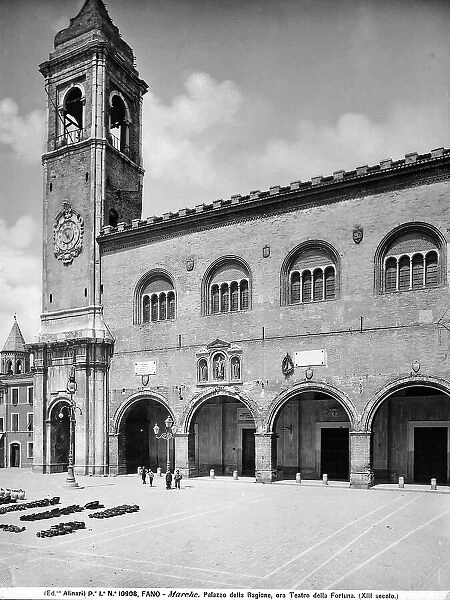 View of the courtyard of the City Hall (Palazzo del Comune) in Fano. On the right a wide staircase to the first floor of the building which is surrounded by an arcade