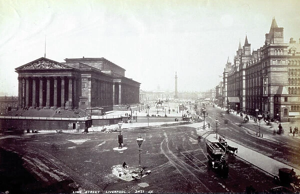 View of Lime Street in the historical center of Liverpool. On the left Saint George's Hall, monumental Nineteenth century building in Neoclassic style. In the background Wellington's Column can be glimpsed