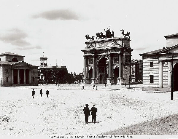 View with people of the large square of the Arch of the Peace in Milan