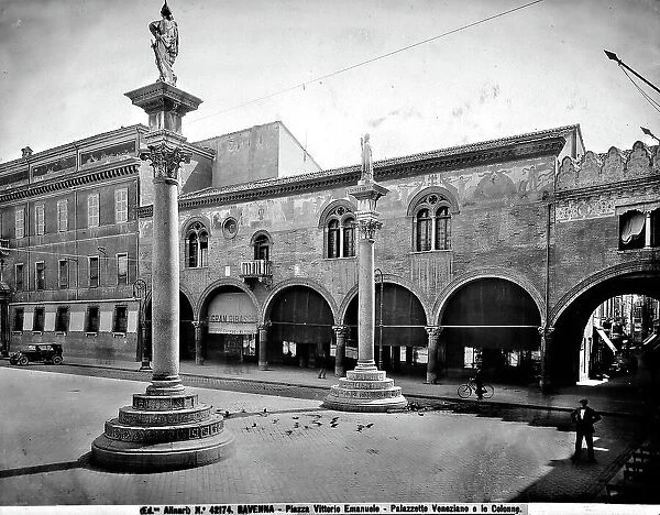 View of the Venetian Palazzetto in Piazza del Popolo, Ravenna. Two columns surmounted by statues held up by Venetians, imitation of the Piazzetta of S. Marco in Venice, are in front of the palazzo