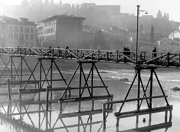 Wooden temporary bridge in Lungarno Torrigiani, Firenze, where Ponte alle Grazie was bombed and pulled down in 1944