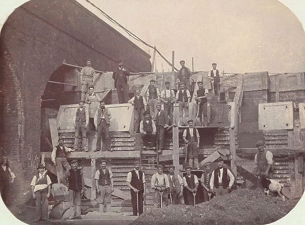 Workers on a building site at Tower Bridge