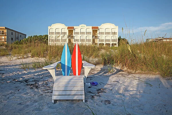 Florida, Saint Petersburg Beach, adirondack chair in front of beachfront home