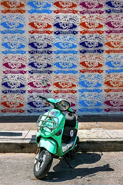 Texas, Austin, Mexican American Fine Art Museum of Texas exterior wall with scooter