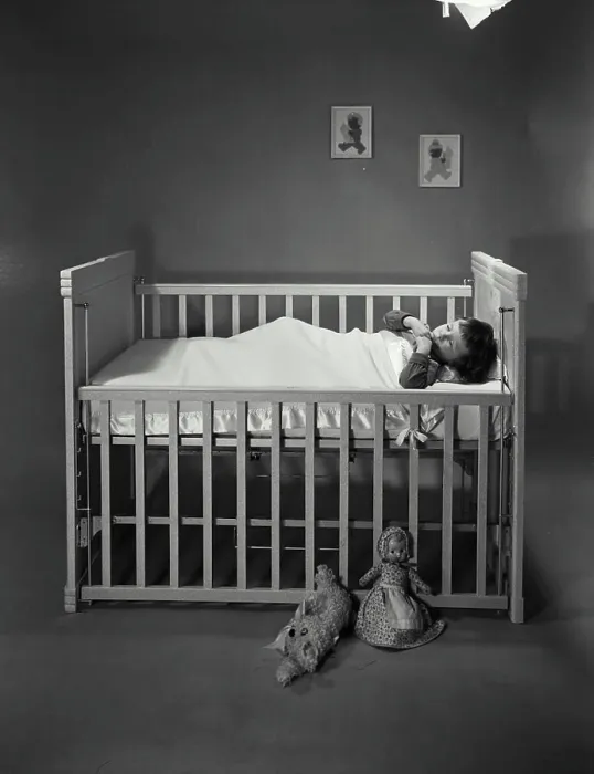 Framed Print : Boy sleeping in crib Print Framed Print : Boy sleeping in crib Print