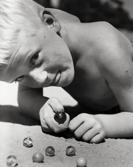 Framed Print : Close-up Print of a Boy Playing Marbles Framed Print : Close-up Print of a Boy Playing Marbles