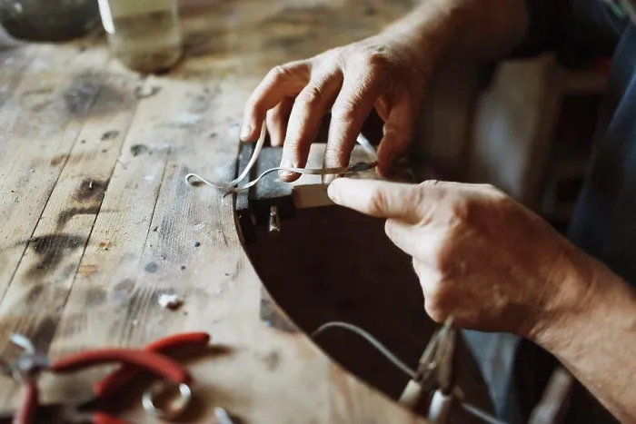 Framed Print : Craftsman Working in Print Framed Print : Craftsman Working in Print