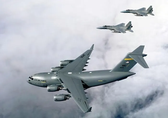 Framed Print : Print of F-15B Eagles Escorting a C-17 Globemaster III Framed Print : Print of F-15B Eagles Escorting a C-17 Globemaster III