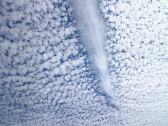 Framed Print : Jetstream Print: Dissipating Path Through Fluffy Clouds