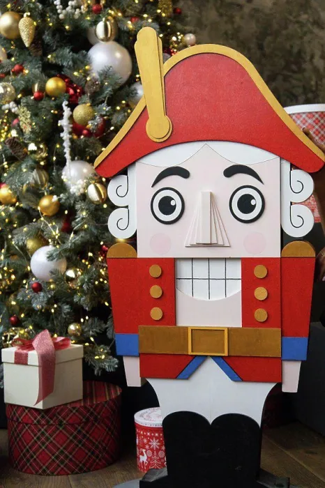 Framed Print : Red Nutcracker Print Near Christmas Tree Framed Print : Red Nutcracker Print Near Christmas Tree