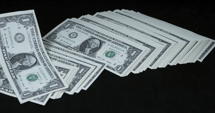 Framed Print : US Dollar Banknotes Print Falling Against Black Background Framed Print : US Dollar Banknotes Print Falling Against Black Background