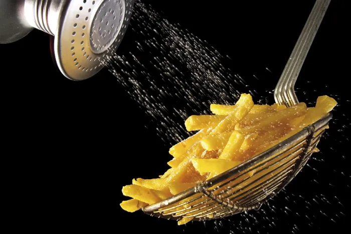 Framed Print : Adding Salt to Chips Print Framed Print : Adding Salt to Chips Print