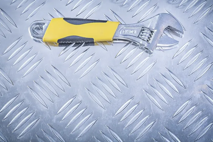 Framed Print : Adjustable Spanner Print on Chequer Plate Framed Print : Adjustable Spanner Print on Chequer Plate