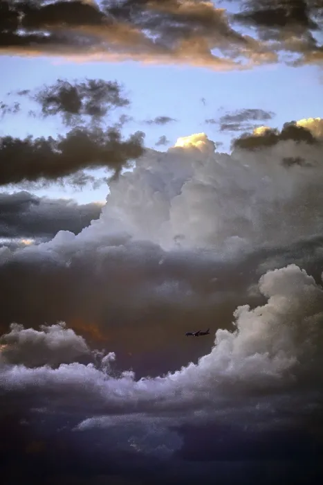 Framed Print : Airplane in Front of a Cloud Print
