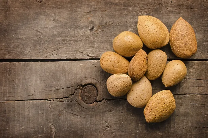 Framed Print : Almonds on a rustic wooden table Print Framed Print : Almonds on a rustic wooden table Print