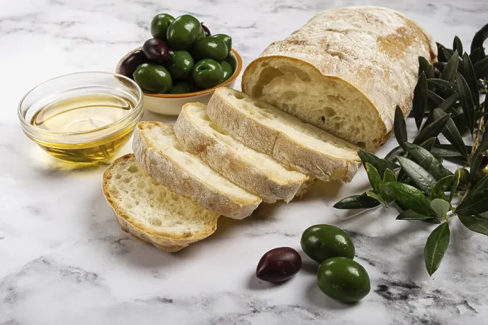 Framed Print : Appetizer Print: Sliced Ciabatta with Olives on Marble Table Framed Print : Appetizer Print: Sliced Ciabatta with Olives on Marble Table
