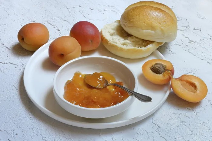 Framed Print : Apricot jam in shell and sliced roll print Framed Print : Apricot jam in shell and sliced roll print