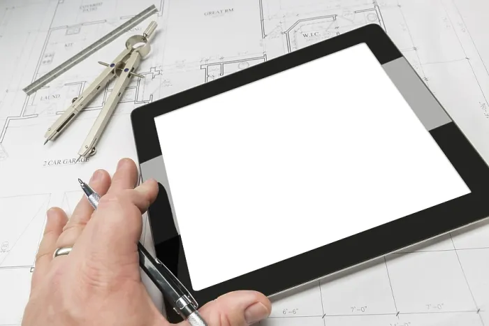 Framed Print : Architect Working on Print of House Plans Framed Print : Architect Working on Print of House Plans
