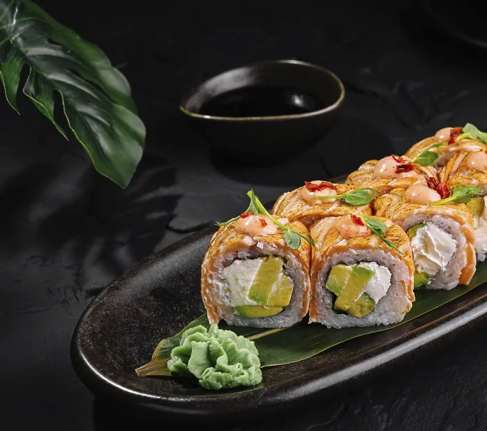 Framed Print : Artfully presented sushi print on a sleek, black plate Framed Print : Artfully presented sushi print on a sleek, black plate