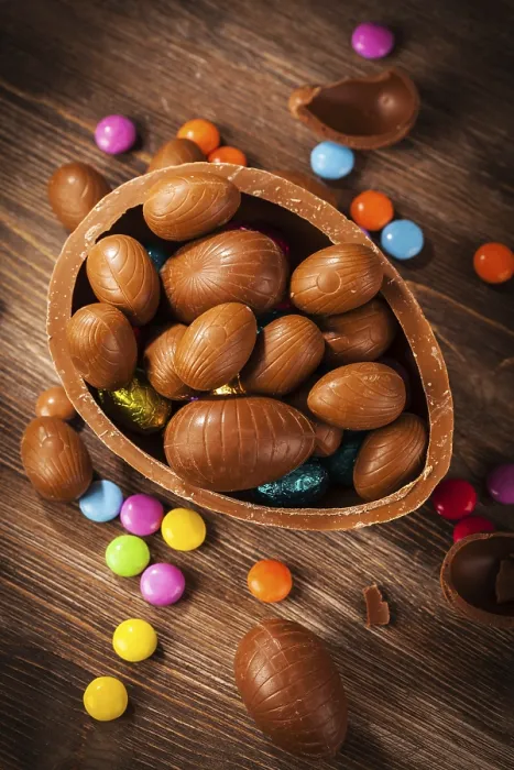 Framed Print : Assorted Chocolate Easter Print on Wooden Background Framed Print : Assorted Chocolate Easter Print on Wooden Background