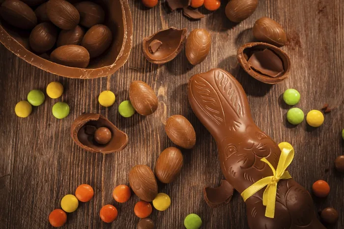 Framed Print : Assorted Chocolate Easter Print on Wooden Background Framed Print : Assorted Chocolate Easter Print on Wooden Background