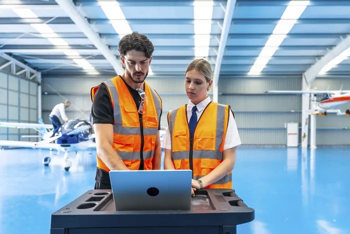 Framed Print : Aviation Professionals Collaborating in Hangar Print Framed Print : Aviation Professionals Collaborating in Hangar Print