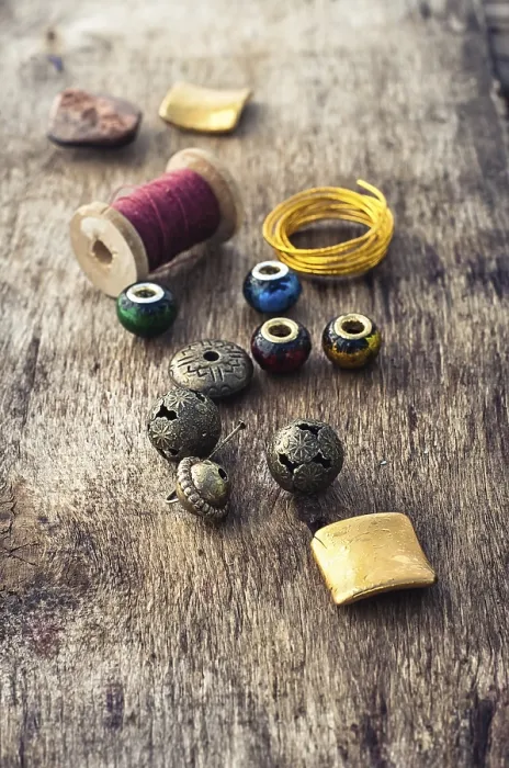 Framed Print : Beads, Thread and Tools on Wooden Background Print Framed Print : Beads, Thread and Tools on Wooden Background Print