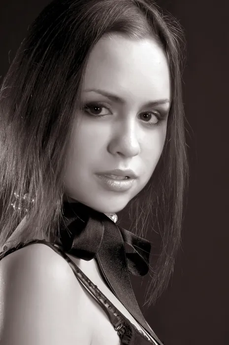 Framed Print : Beautiful Brunette in Studio Print on Black Background Framed Print : Beautiful Brunette in Studio Print on Black Background