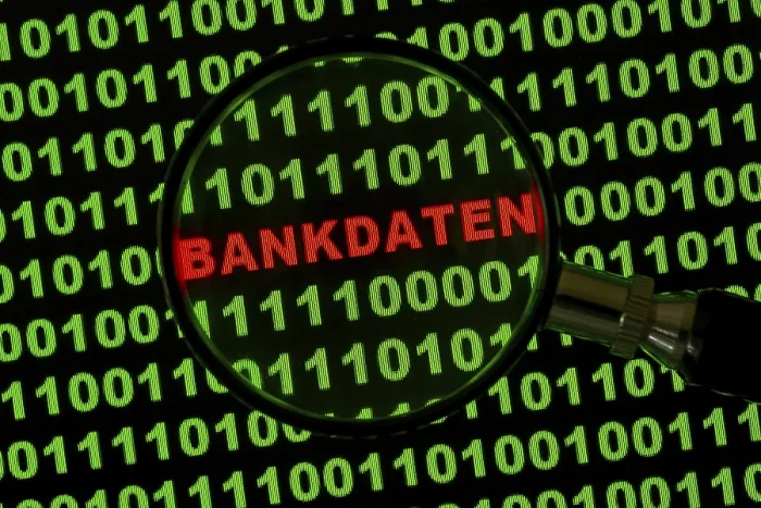 Framed Print : Bankdaten Binary Code Print viewed through a magnifying glass Framed Print : Bankdaten Binary Code Print viewed through a magnifying glass