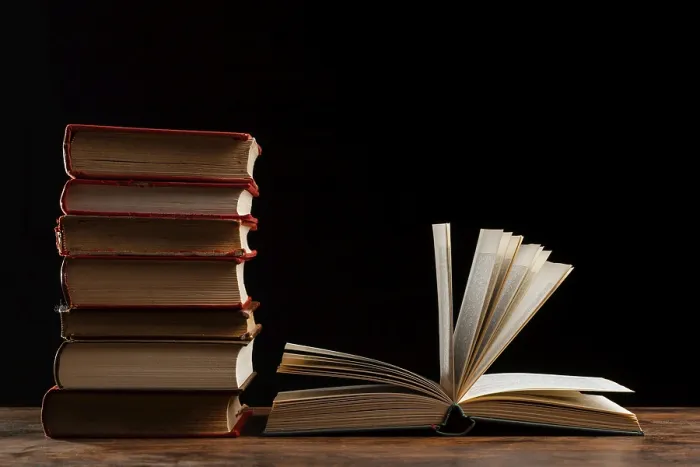Framed Print : Dark Background Print of Stacked Books Framed Print : Dark Background Print of Stacked Books