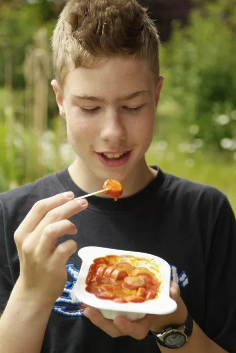 Framed Print : Boy Eats Curry Sausage Print Framed Print : Boy Eats Curry Sausage Print