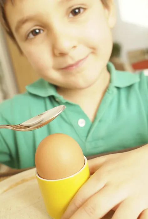 Framed Print : Boy Eats an Egg Print Framed Print : Boy Eats an Egg Print