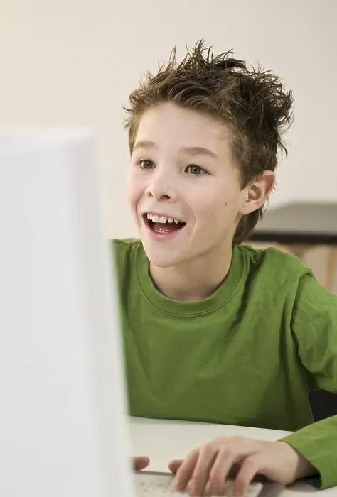 Framed Print : Boy Laughing in Front of Computer Print Framed Print : Boy Laughing in Front of Computer Print