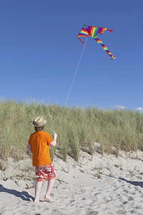 Framed Print : Boy playing with a kite on the beach Print, Wustrow, Germany Framed Print : Boy playing with a kite on the beach Print, Wustrow, Germany