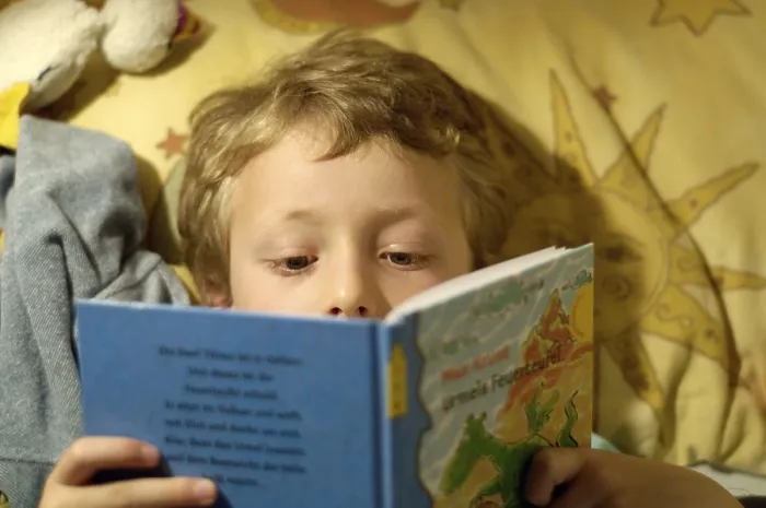 Framed Print : Boy Reading in Bed Print Framed Print : Boy Reading in Bed Print